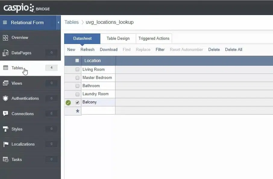 Screenshot of Caspio’s app builder. It shows the “Tables” section and is opened at the “Datasheet” tab. The sample item “Balcony” is selected in the list.